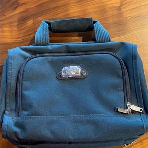 Ricardo hanging toiletries Bag. Tons of pockets.